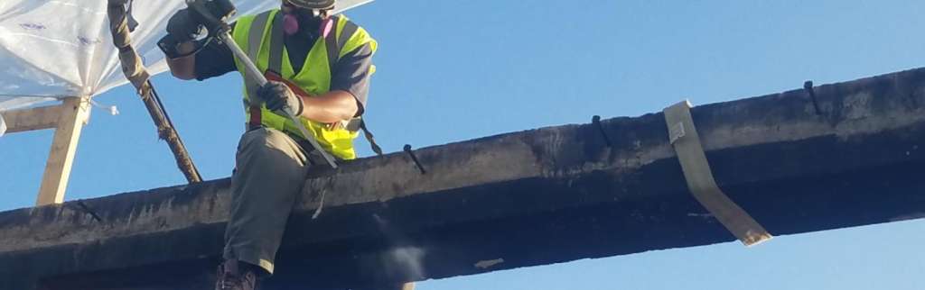 Worker on a beam