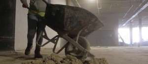 Worker with a wheelbarrow